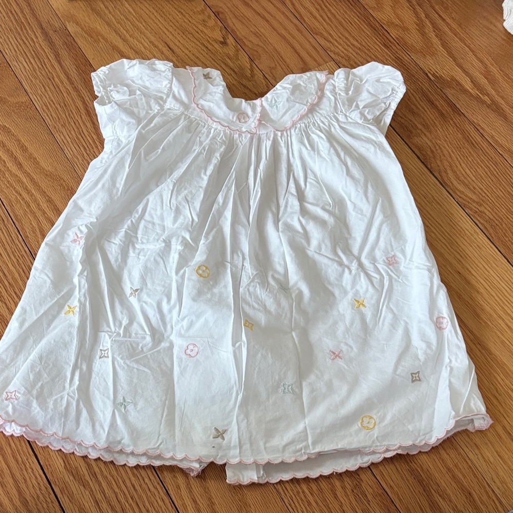 White Mutli color embroidery dress